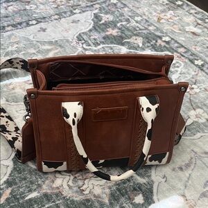 Elegant Brown Leather Messenger Bag with Cow Print Accents